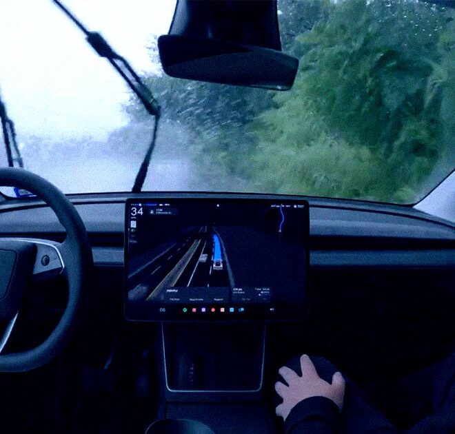 Reckless Footage Shows Tesla Robotaxi Careening Through Heavy Rain at High Speed