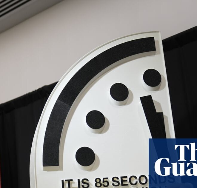 Doomsday Clock at 85 seconds to midnight amid threats from climate crisis and AI | US news